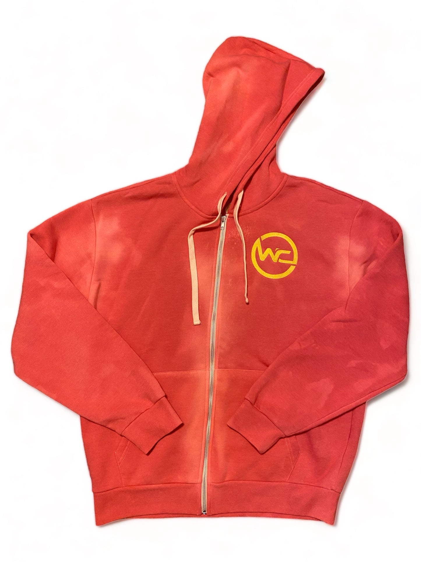 Sunset color way of the “🚾” logo zip-up hoodie